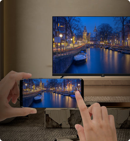 FPD 55" Google TV screen mirroring from smartphone, showcasing smart features and seamless content sharing